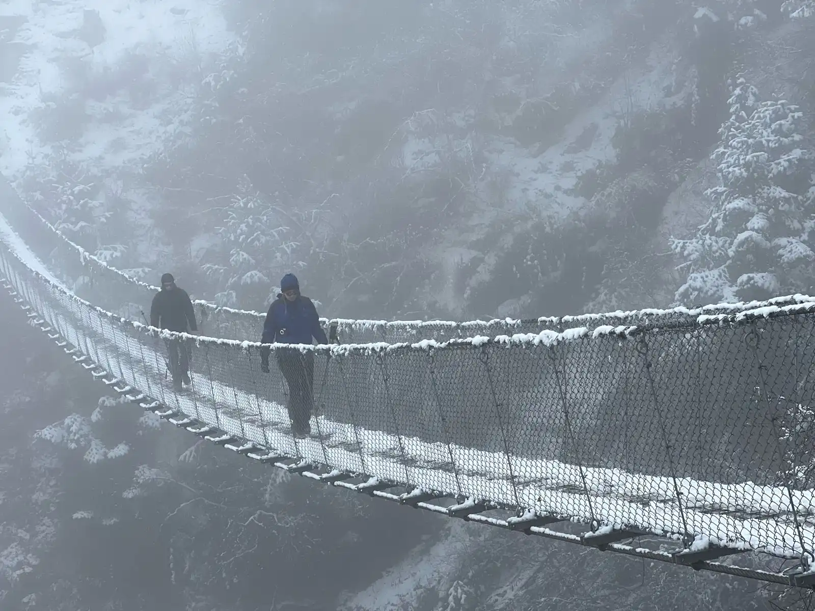 Snow Covered Suspension Bridge Manaslu
